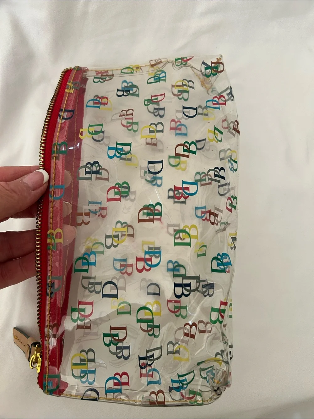 Dooney & Bourke Clear Cosmetic Pouch with Multicolor DB Print and Red Trim